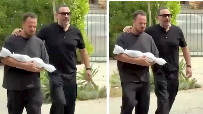 أحمد ماجد المصري يودع طفله باكيا ويؤدي صلاة الجنازة عليه